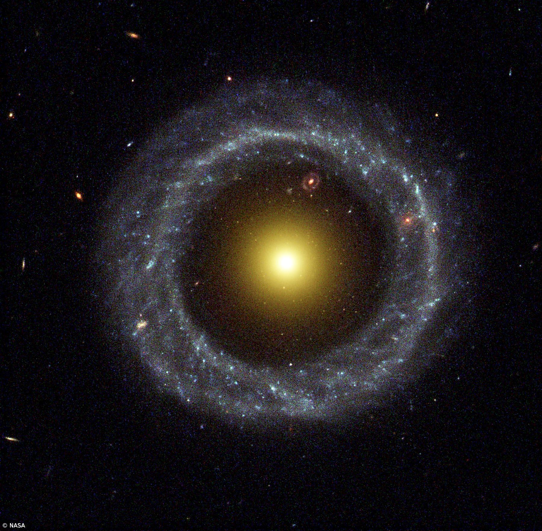 Descoberto asteroide com carbono, elemento da vida, para lá da órbita de Neptuno – Imagem 1